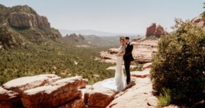 A bride and groom pose at their wedding in Sedona, Arizona.