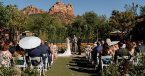 A bride and groom pose at their Sedona wedding at Amara Resort.