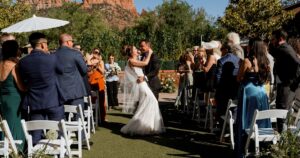 A bride and groom pose at their Sedona wedding at Amara Resort.