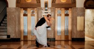 A couple poses indoors at the Luhrs Tower in downtown Phoenix.