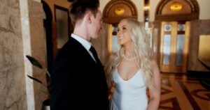 A couple poses indoors at the Luhrs Tower in downtown Phoenix.