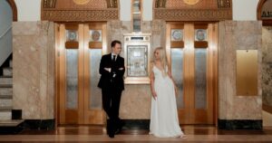 A couple poses indoors at the Luhrs Tower in downtown Phoenix.