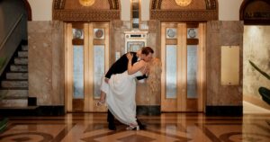 A couple poses indoors at the Luhrs Tower in downtown Phoenix.