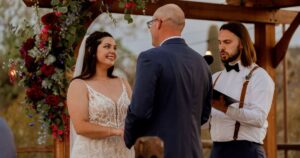 A bride and groom pose at their Tucson wedding at Wildhorse ranch.