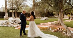 A bride and groom share a first look at Wildhorse Ranch.