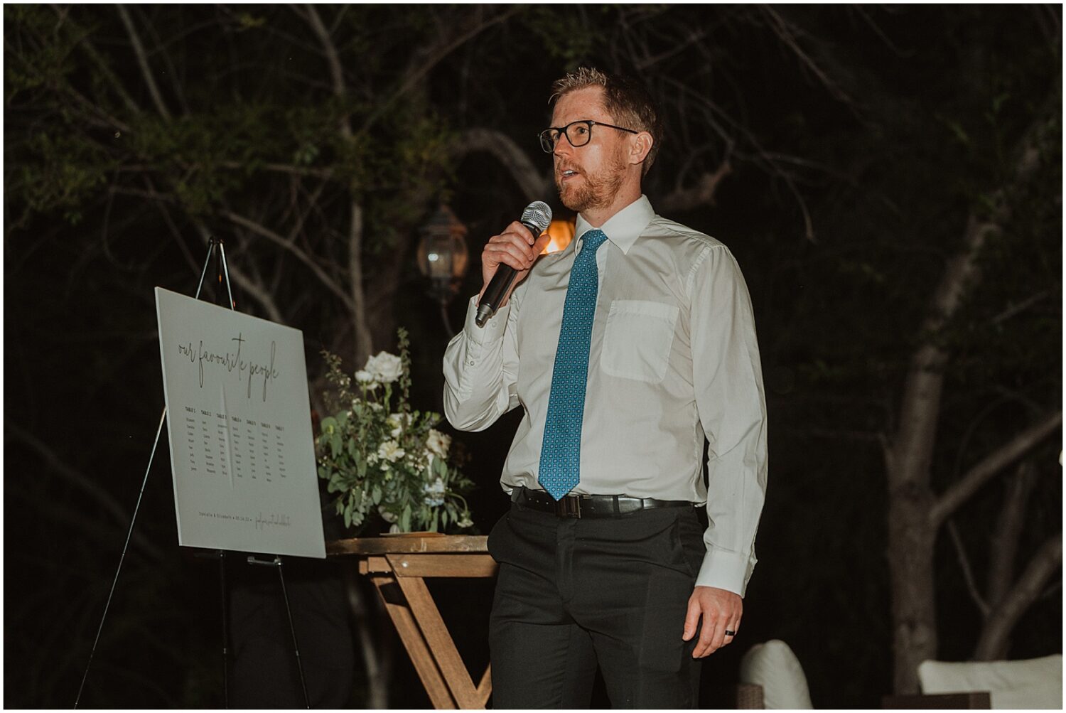A wedding guest gives a speech.
