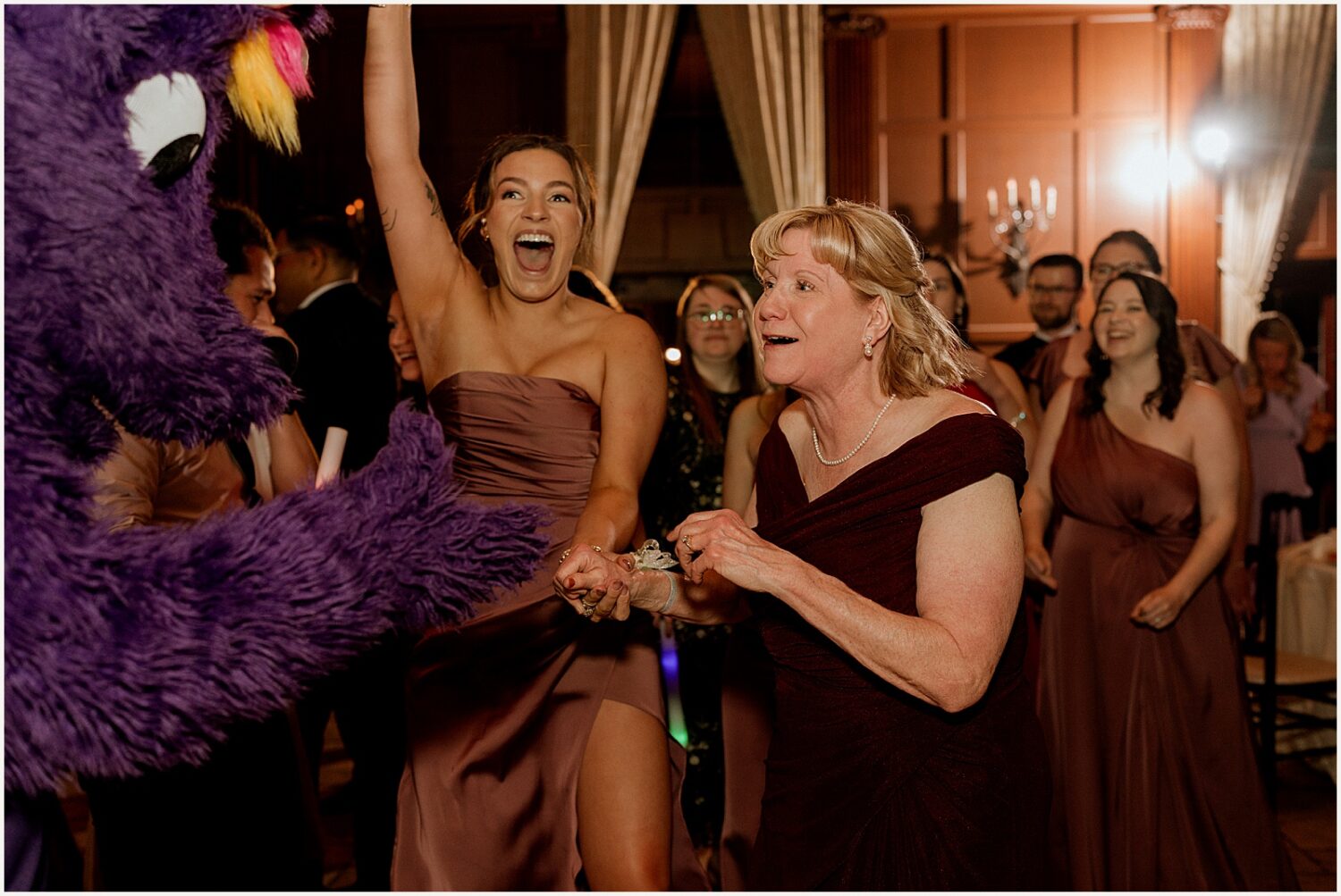 Wedding guests dance with Scorch.